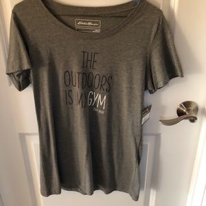 Gray tee shirt that says “The Outdoors is my GYM”